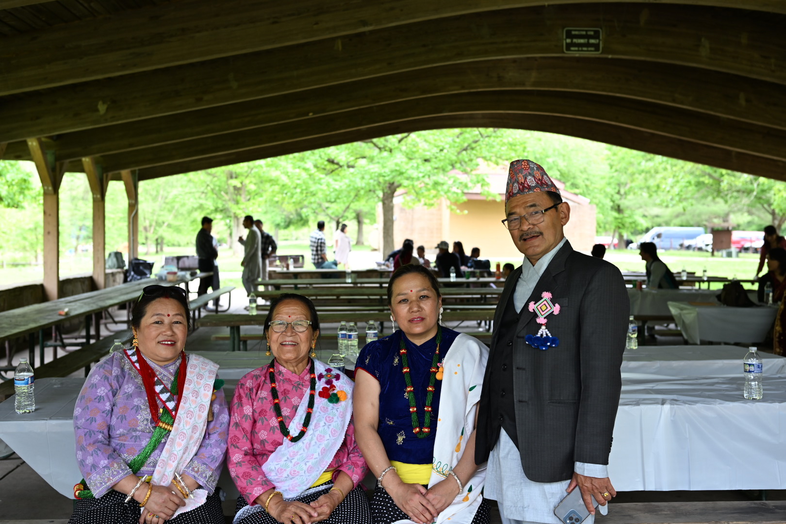 Family members wearing traditional clothing